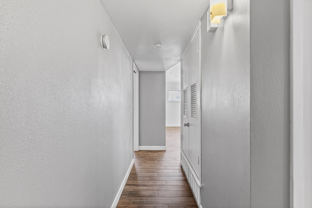 2616 E 21st St, Odessa, TX 79761 - hall featuring dark wood finished floors and baseboards