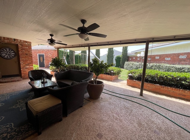 view of patio / terrace featuring a ceiling fan