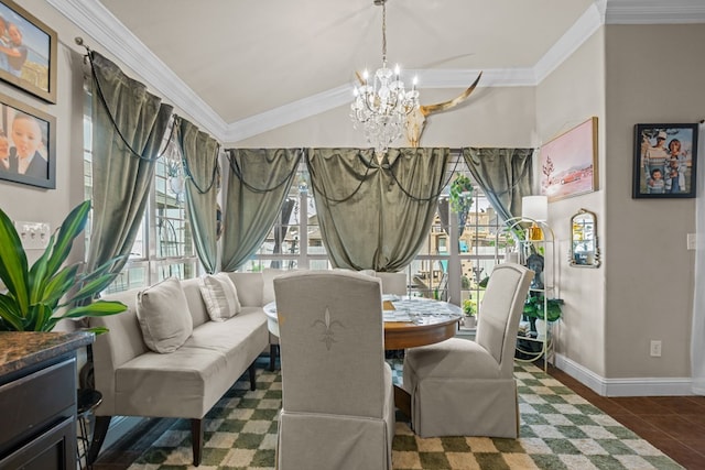 609 E 96th Ct, Odessa, TX 79765 - dining room featuring a chandelier, healthy amount of natural light, crown molding, baseboards, and lofted ceiling