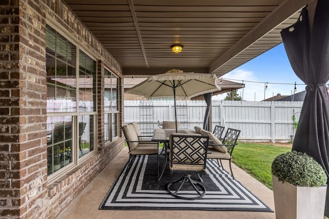 609 E 96th Ct, Odessa, TX 79765 - view of patio / terrace featuring outdoor dining area