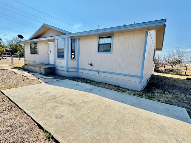 manufactured / mobile home with a patio area and fence