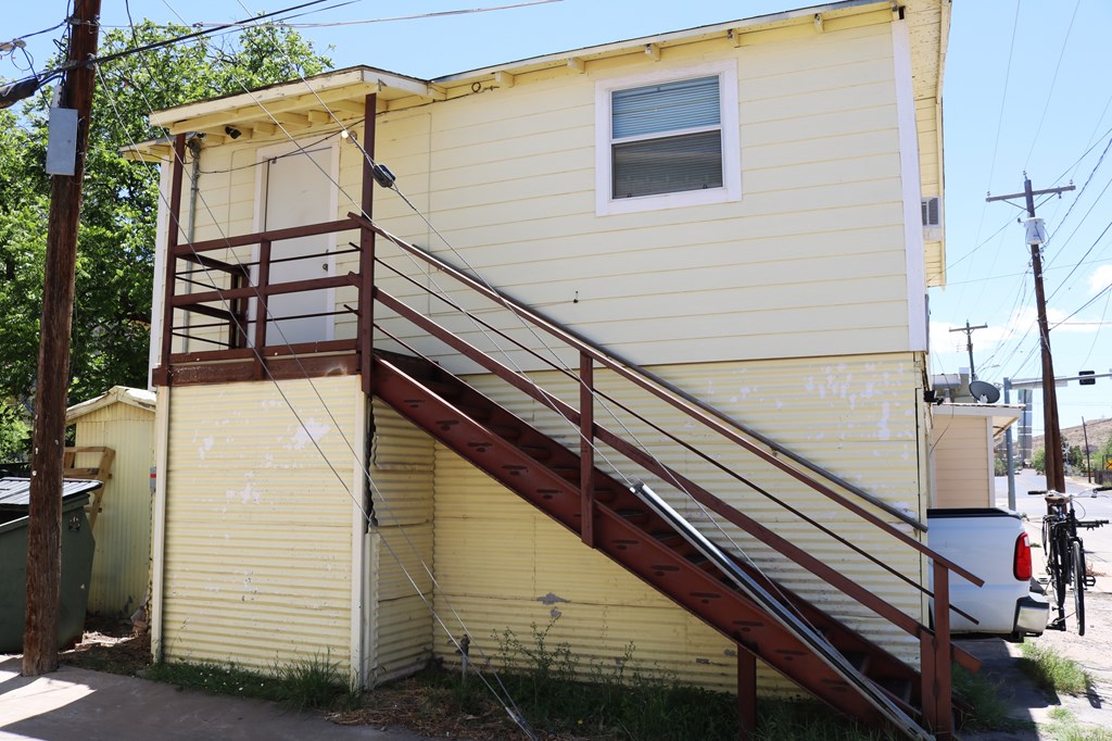 805 E Holland Ave, Alpine, TX 79830 - back of house featuring stairs