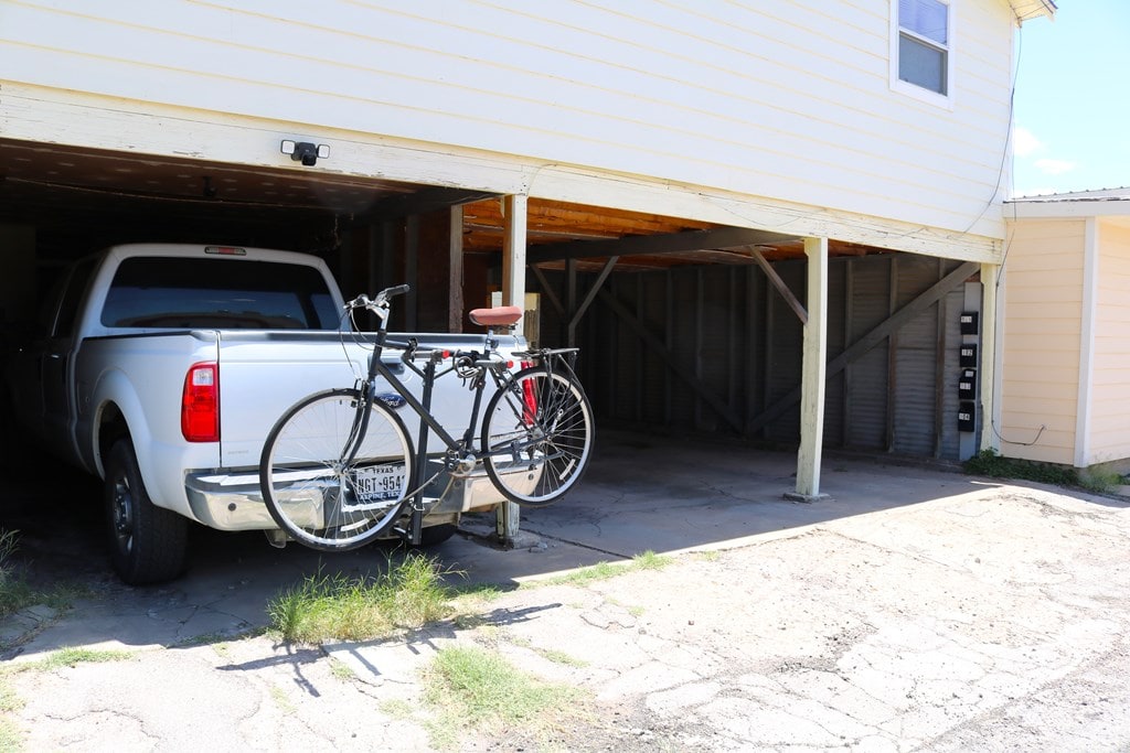 805 E Holland Ave, Alpine, TX 79830 - view of parking with a carport
