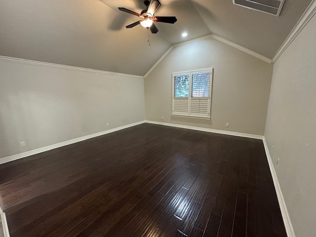 1205 Silverton Dr, Midland, TX 79705 - additional living space featuring dark wood finished floors, ceiling fan, and vaulted ceiling