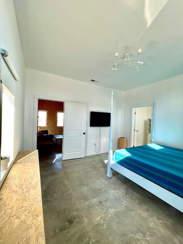 702 E Washington St, Marfa, TX 79843 - bedroom with concrete floors and visible vents