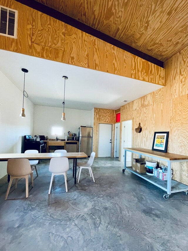 702 E Washington St, Marfa, TX 79843 - dining room featuring concrete floors and visible vents