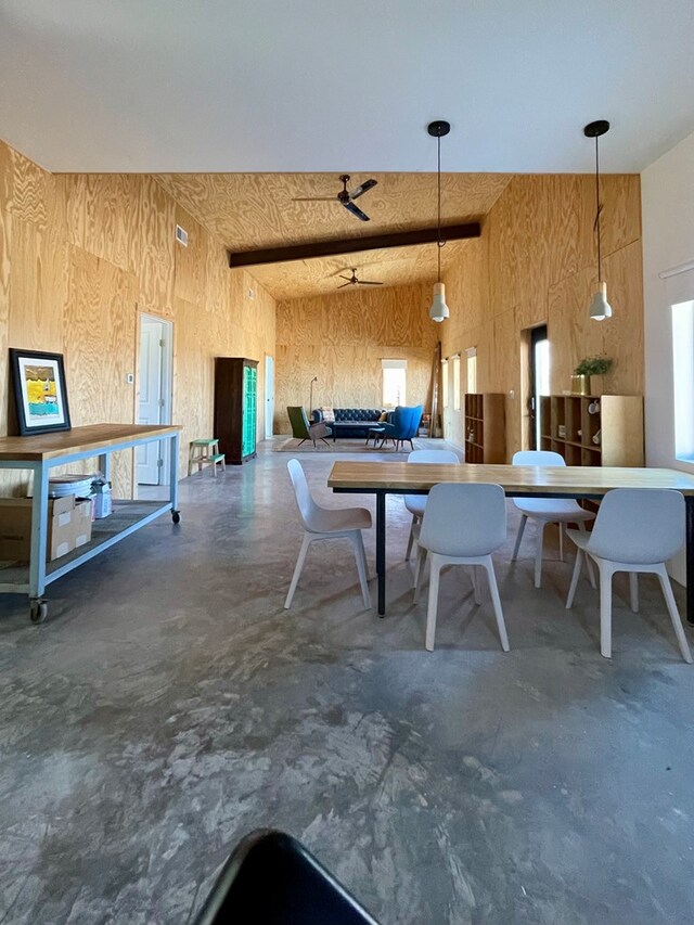 702 E Washington St, Marfa, TX 79843 - dining room with finished concrete flooring and high vaulted ceiling