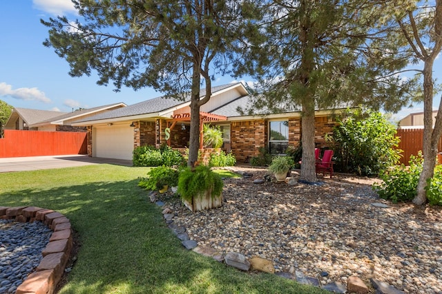 1324 Pagewood Ave, Odessa, TX 79761 - single story home with a garage, driveway, and brick siding