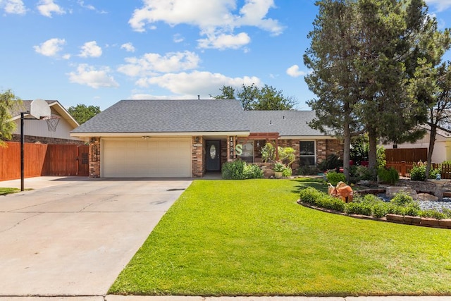 1324 Pagewood Ave, Odessa, TX 79761 - mid-century home featuring an attached garage, driveway, a shingled roof, and brick siding