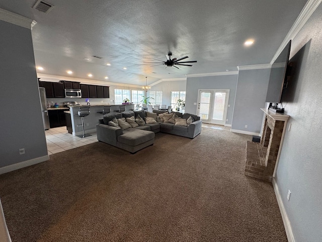 616 96th St, Odessa, TX 79765 - living room featuring ornamental molding, light colored carpet, recessed lighting, a ceiling fan, and a brick fireplace