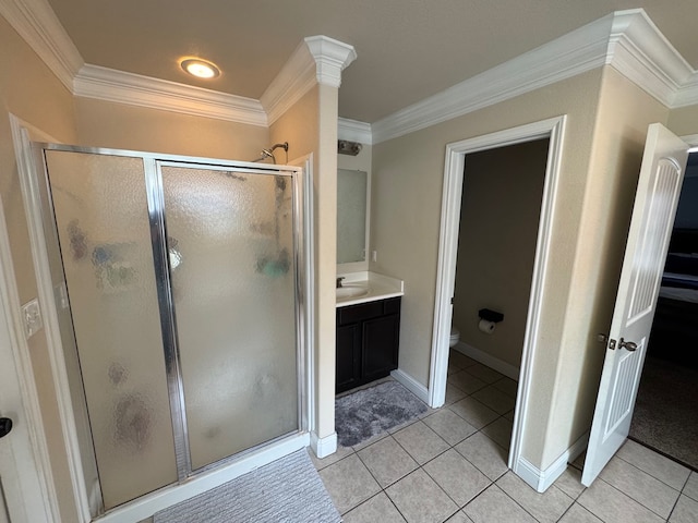 616 96th St, Odessa, TX 79765 - full bathroom featuring a shower stall, ornamental molding, tile patterned flooring, and vanity