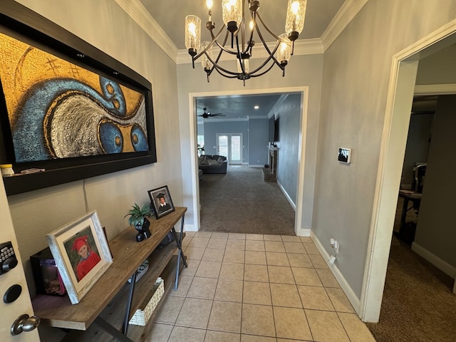 616 96th St, Odessa, TX 79765 - corridor with ornamental molding, carpet flooring, a chandelier, and tile patterned floors