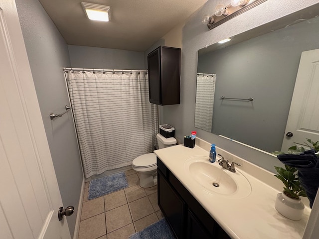 616 96th St, Odessa, TX 79765 - bathroom featuring vanity, tile patterned floors, and a shower with curtain