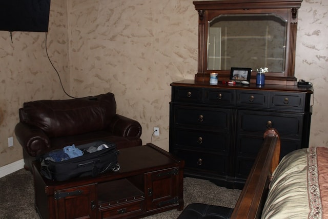 carpeted living room with baseboards