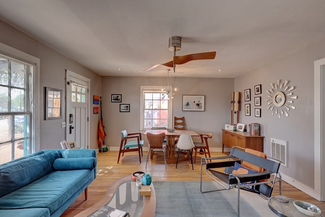 408 W 2nd St, Marfa, TX 79843 - living room featuring light wood-style floors, ceiling fan, and baseboards