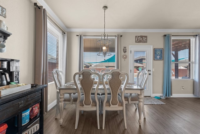 7028 Xit Ranch Rd, Odessa, TX 79765 - dining area with wood finished floors, healthy amount of natural light, a chandelier, and ornamental molding