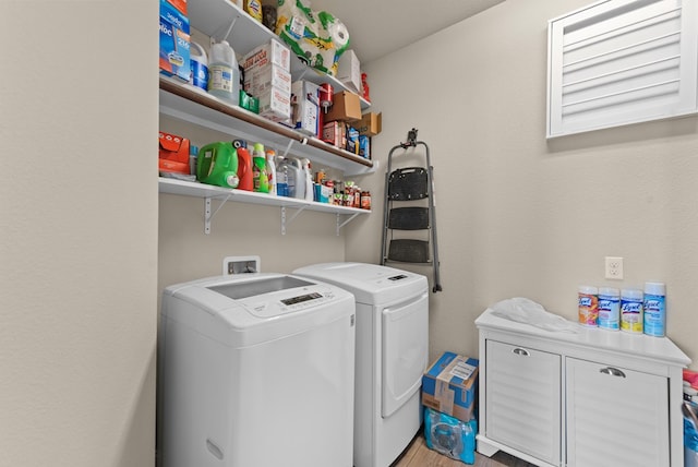 7028 Xit Ranch Rd, Odessa, TX 79765 - laundry area with washing machine and dryer and light wood-style floors