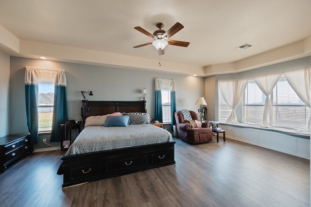 bedroom featuring hardwood / wood-style flooring and ceiling fan