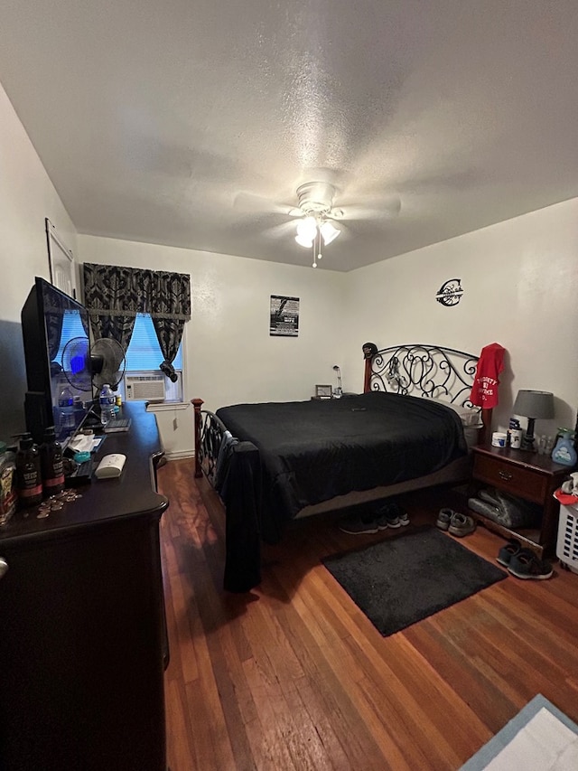 414 E 45th St, Odessa, TX 79762 - bedroom featuring wood finished floors, a ceiling fan, and cooling unit