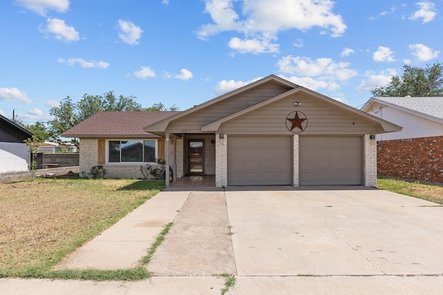 single story home with brick siding, concrete driveway, and an attached garage