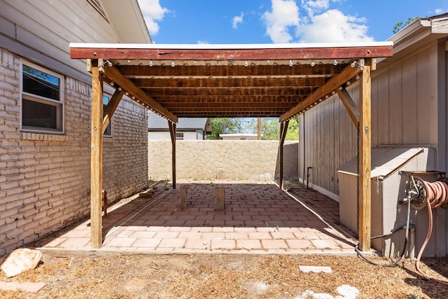 view of patio / terrace with fence