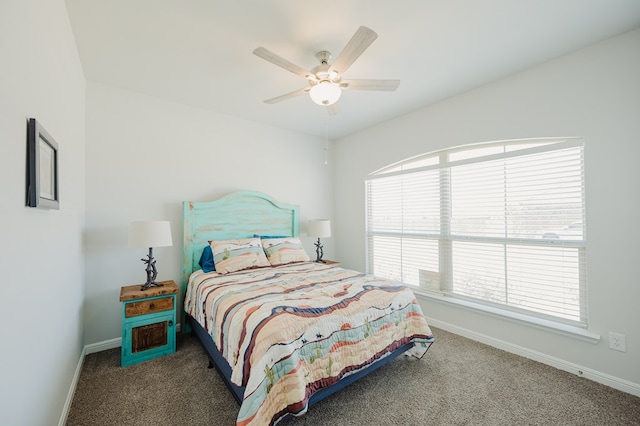 7521 Iron Mountain Rd, Odessa, TX 79765 - carpeted bedroom with baseboards and a ceiling fan