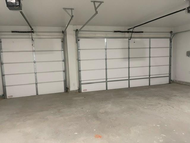 3117 Blue Quail Ct, Midland, TX 79705 - garage featuring a garage door opener