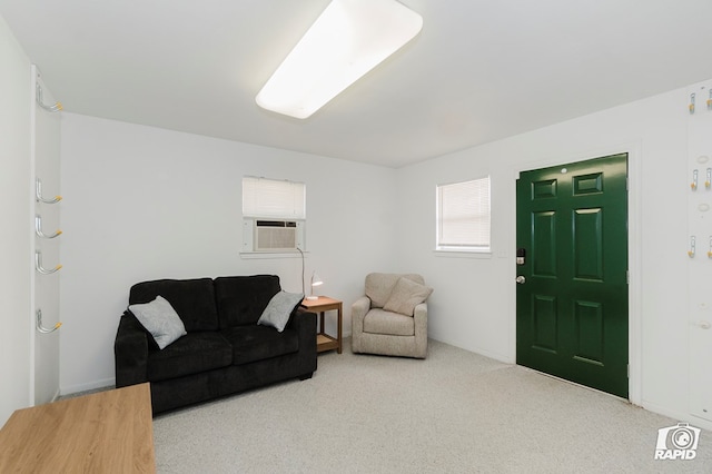 living area with cooling unit and carpet floors