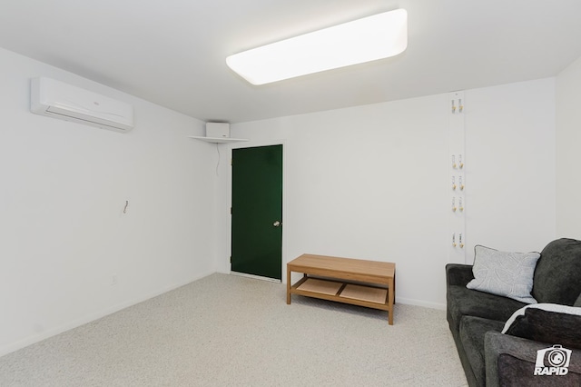 sitting room with light colored carpet, baseboards, and a wall unit AC