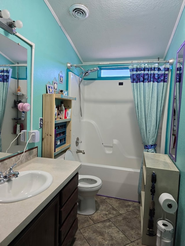 bathroom featuring visible vents, vanity, a textured ceiling, and crown molding