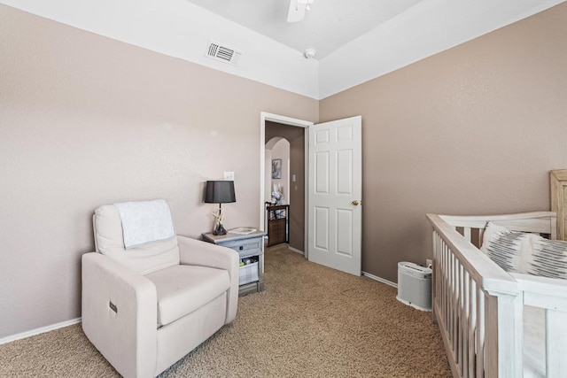 404 SW 21st St, Seminole, TX 79360 - bedroom with light carpet, arched walkways, and baseboards