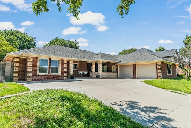 404 SW 21st St, Seminole, TX 79360 - single story home featuring a garage, driveway, brick siding, and a front yard