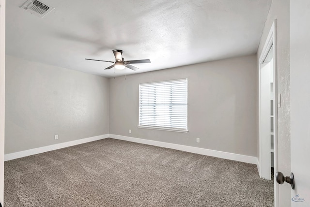 14038 W County Rd 123, Odessa, TX 79765 - spare room with carpet and a ceiling fan