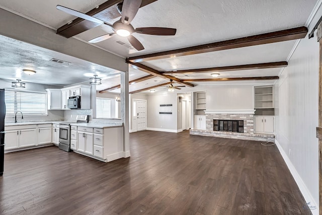 14038 W County Rd 123, Odessa, TX 79765 - kitchen featuring electric range, ceiling fan, a textured ceiling, dark wood finished floors, and white cabinets