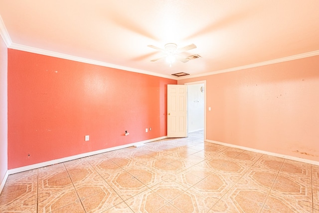 spare room featuring visible vents, baseboards, a ceiling fan, and ornamental molding