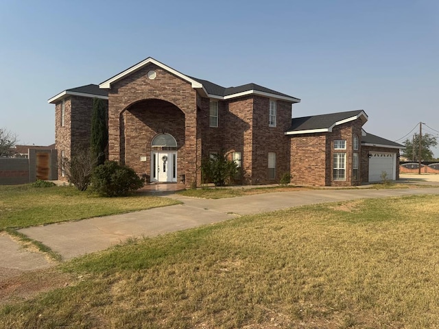 7311 Westmoore Rd, Odessa, TX 79764 - traditional-style house with a front yard, brick siding, a garage, and driveway