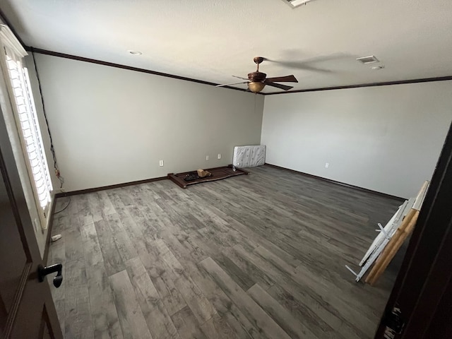 7311 Westmoore Rd, Odessa, TX 79764 - empty room featuring ornamental molding, ceiling fan, and wood finished floors