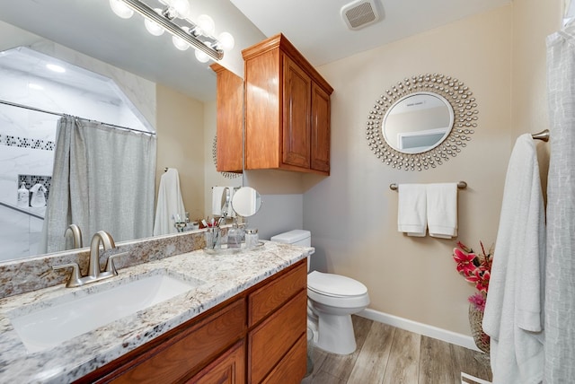 401 Brookover Cir, Odessa, TX 79763 - full bathroom with wood finished floors, vanity, and a shower with shower curtain