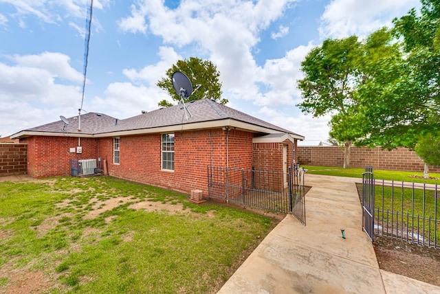 401 Brookover Cir, Odessa, TX 79763 - view of property exterior featuring brick siding and a shingled roof