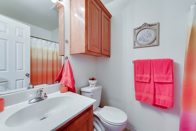 401 Brookover Cir, Odessa, TX 79763 - bathroom featuring toilet and vanity