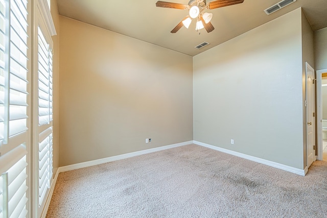 104 Waimea Dr, Odessa, TX 79762 - empty room featuring carpet floors, a ceiling fan, and lofted ceiling