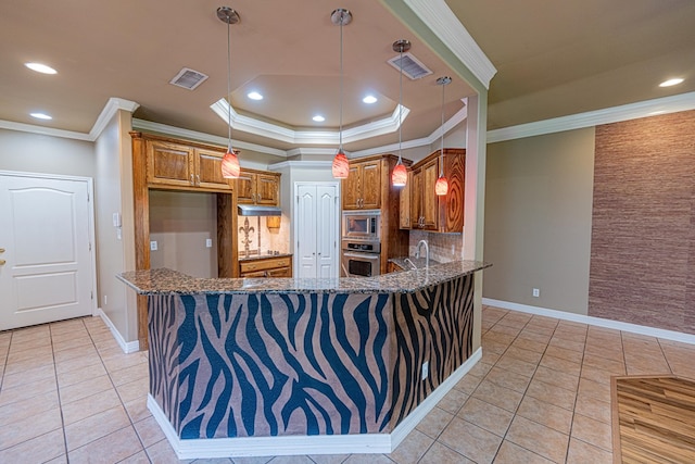 104 Waimea Dr, Odessa, TX 79762 - kitchen featuring appliances with stainless steel finishes, brown cabinets, light tile patterned floors, ornamental molding, and dark stone counters