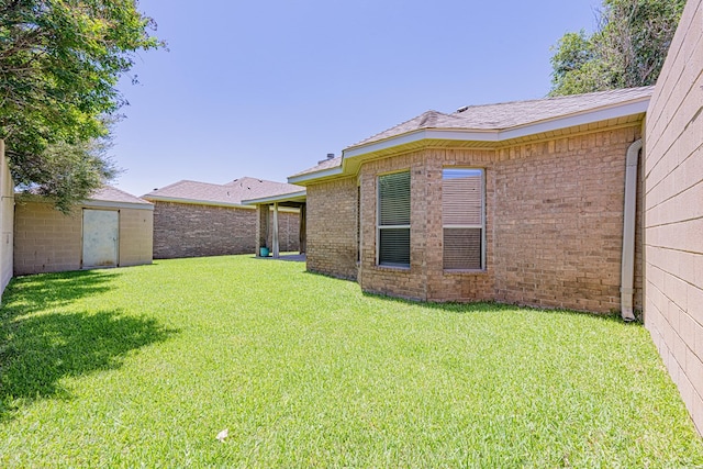 104 Waimea Dr, Odessa, TX 79762 - view of yard with a storage unit