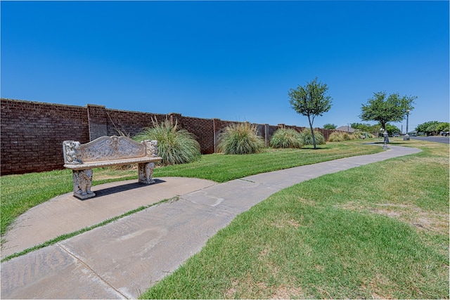104 Waimea Dr, Odessa, TX 79762 - view of community with a lawn