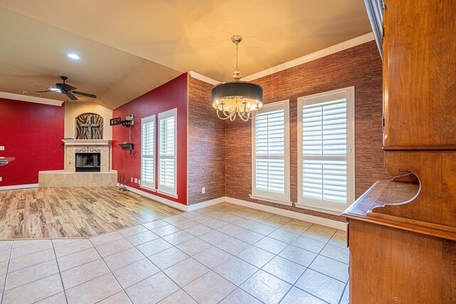 104 Waimea Dr, Odessa, TX 79762 - unfurnished dining area featuring tile patterned floors, a chandelier, plenty of natural light, ceiling fan, and crown molding