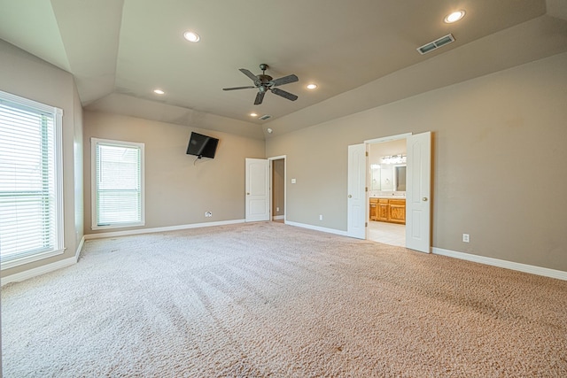 104 Waimea Dr, Odessa, TX 79762 - unfurnished bedroom with light carpet, recessed lighting, lofted ceiling, ensuite bathroom, and a ceiling fan