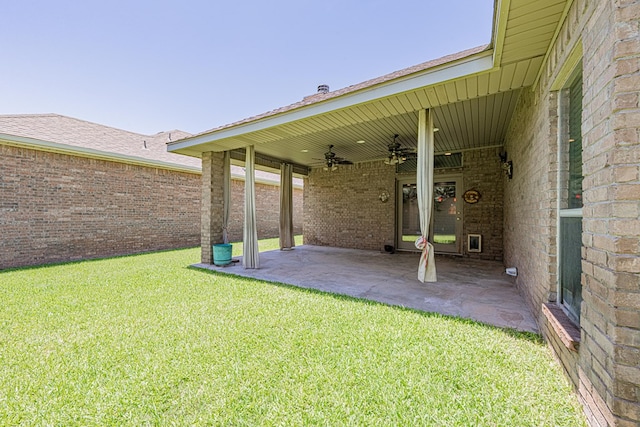 104 Waimea Dr, Odessa, TX 79762 - view of grassy yard featuring a patio and ceiling fan