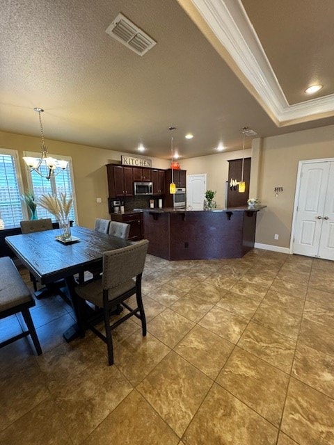 6111 Sun Tea Way, Midland, TX 79705 - tiled dining space with ornamental molding, a chandelier, recessed lighting, baseboards, and a raised ceiling