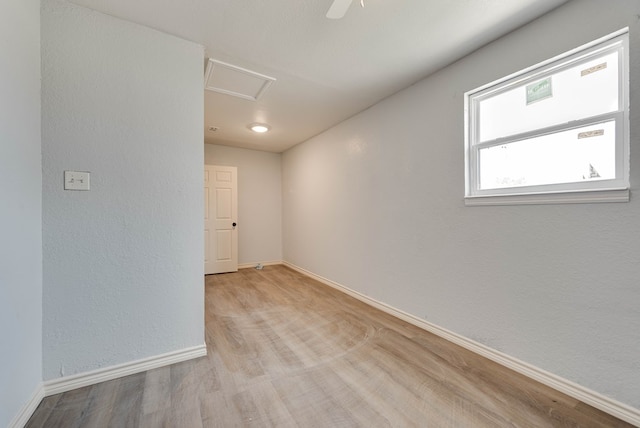 1009 S Terrell St, Midland, TX 79701 - empty room featuring attic access and wood finished floors