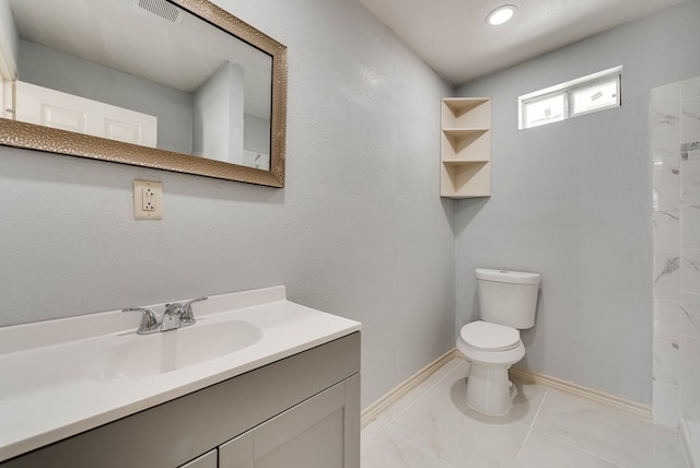 1009 S Terrell St, Midland, TX 79701 - bathroom with vanity and marble finish floors